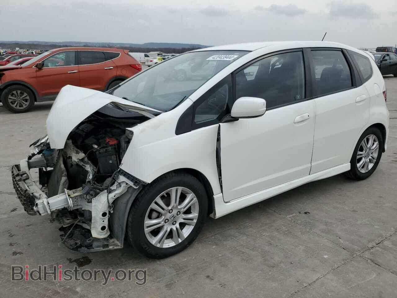 Фотография JHMGE8H58BC012119 - HONDA FIT 2011
