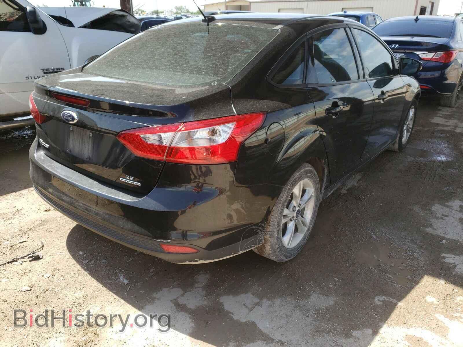 2014 FORD FOCUS - VIN: 1FADP3F21EL387905 - Photo 4