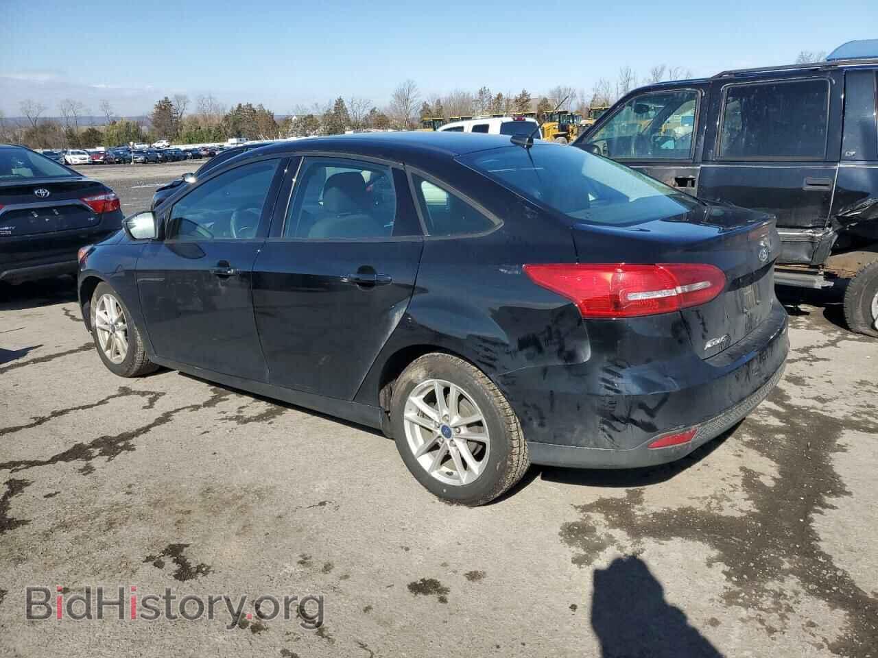 2016 FORD FOCUS - VIN: 1FADP3F26GL381066 - Фото 2
