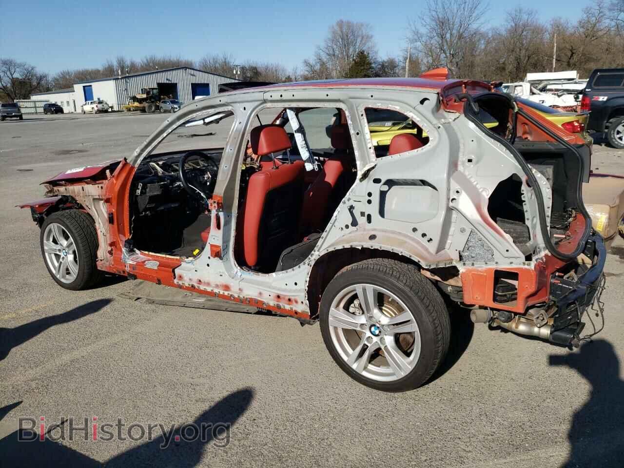 2014 BMW X1 - VIN: WBAVM5C55EVV92811 - Фото 2