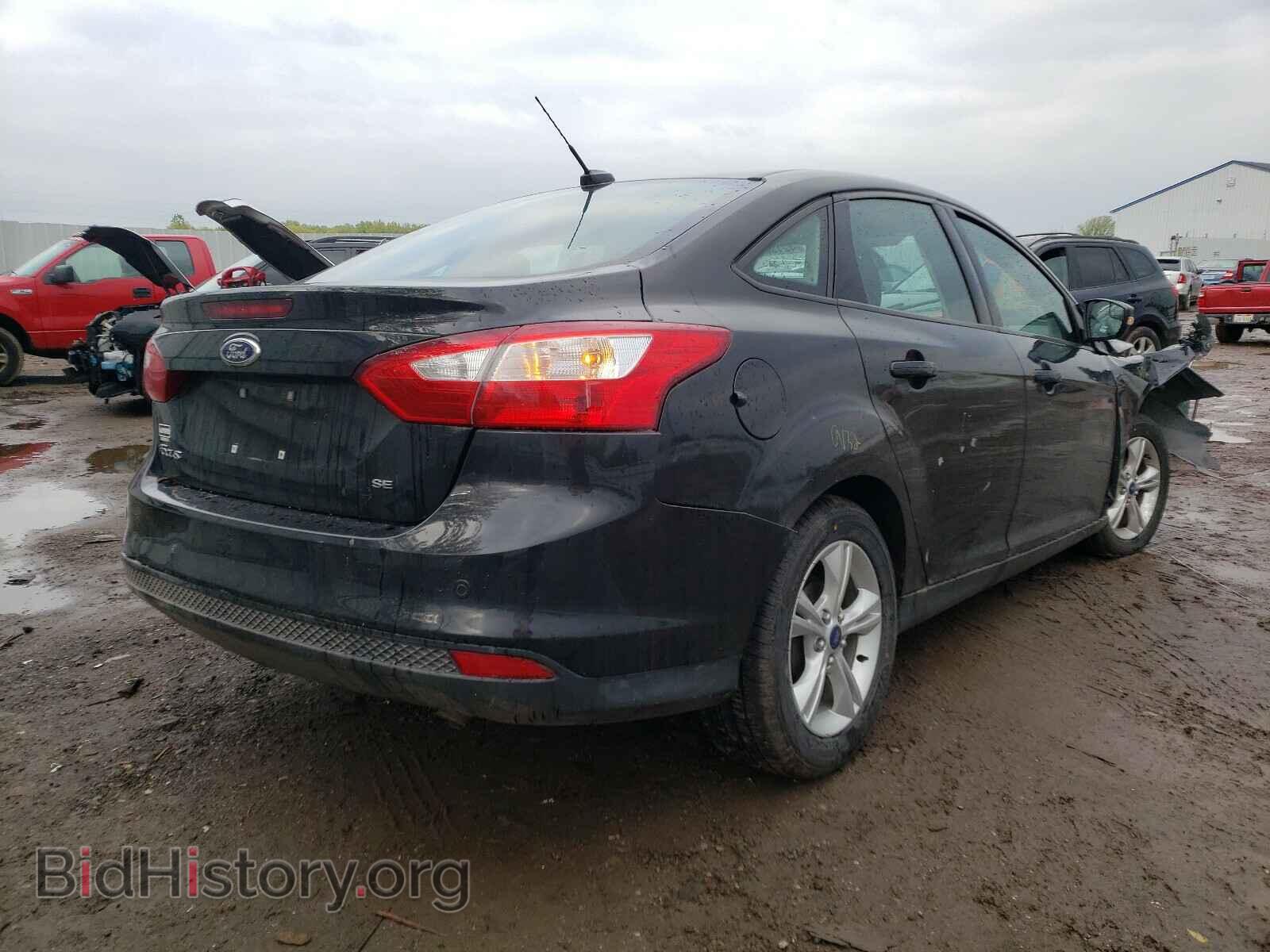 2014 FORD FOCUS - VIN: 1FADP3F2XEL291173 - Photo 4