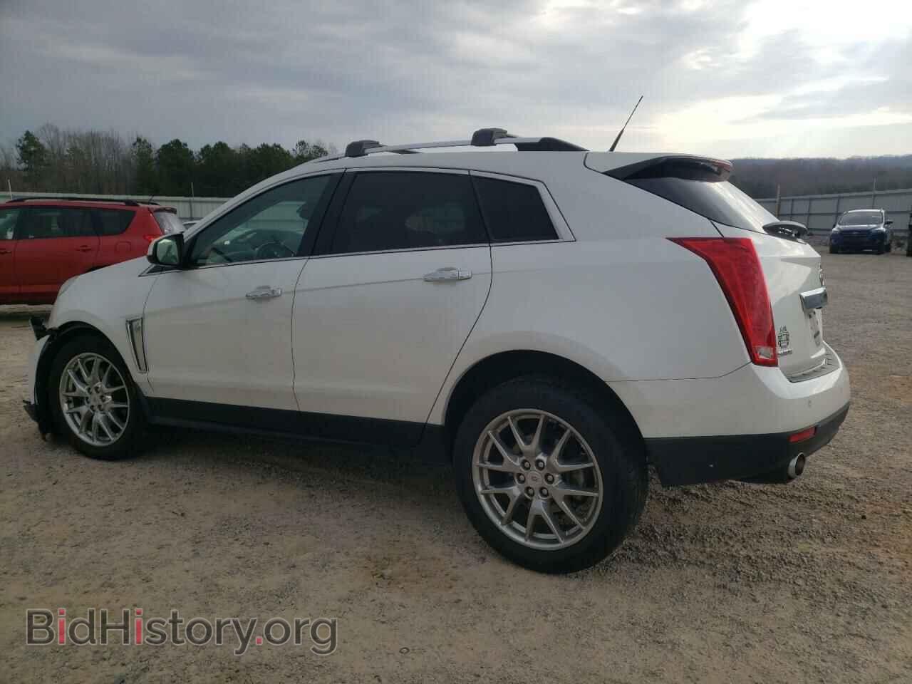 2014 CADILLAC SRX - VIN: 3GYFNCE39ES628066 - Фото 2