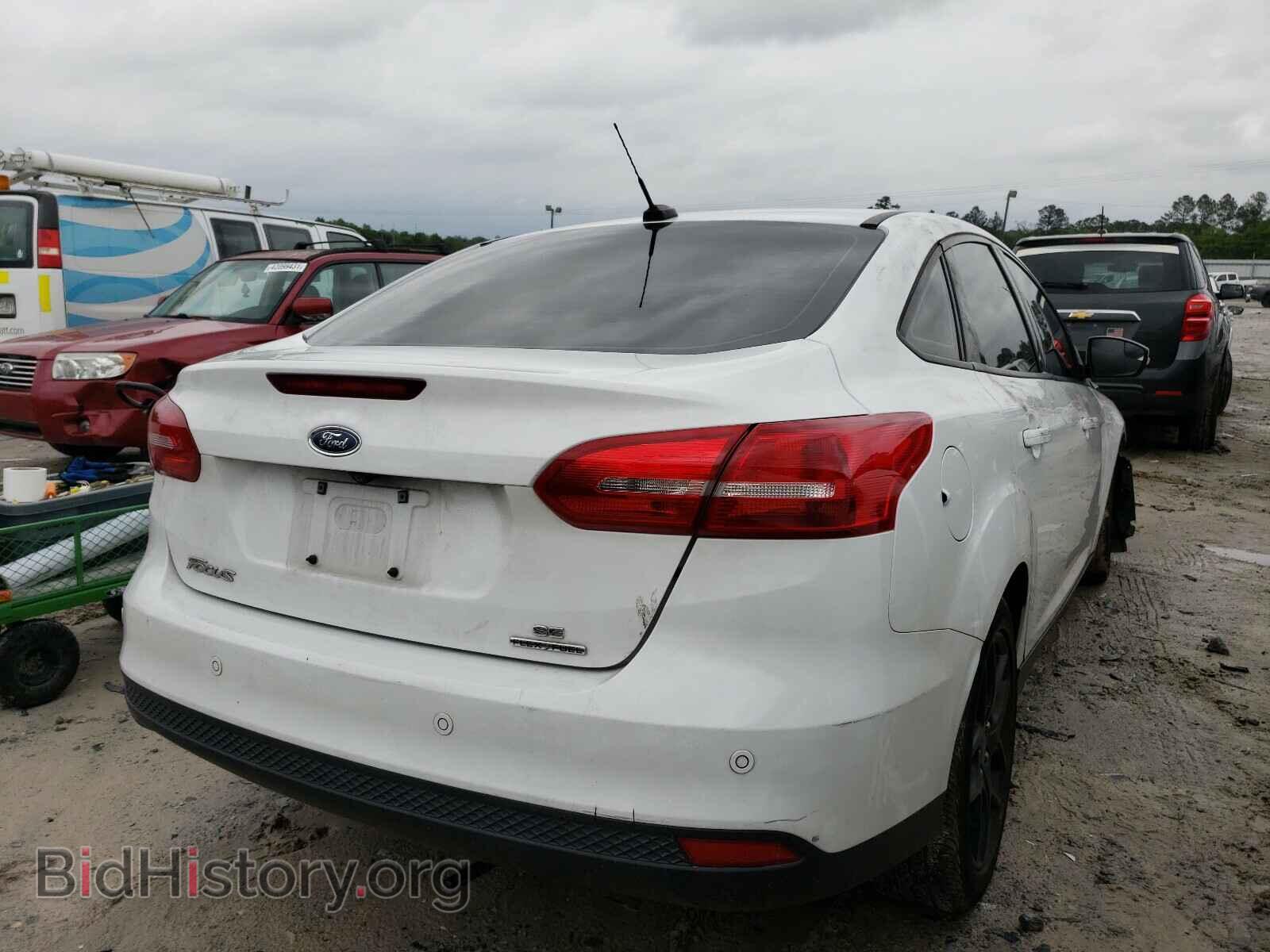 2016 FORD FOCUS - VIN: 1FADP3F29GL392031 - Photo 4