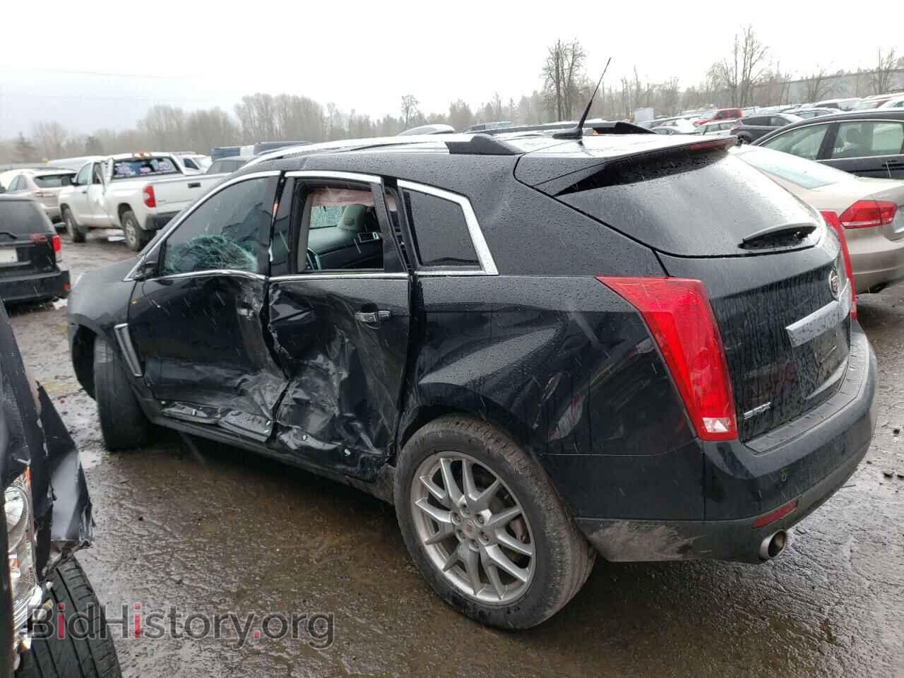 2014 CADILLAC SRX - VIN: 3GYFNCE38ES574663 - Фото 2