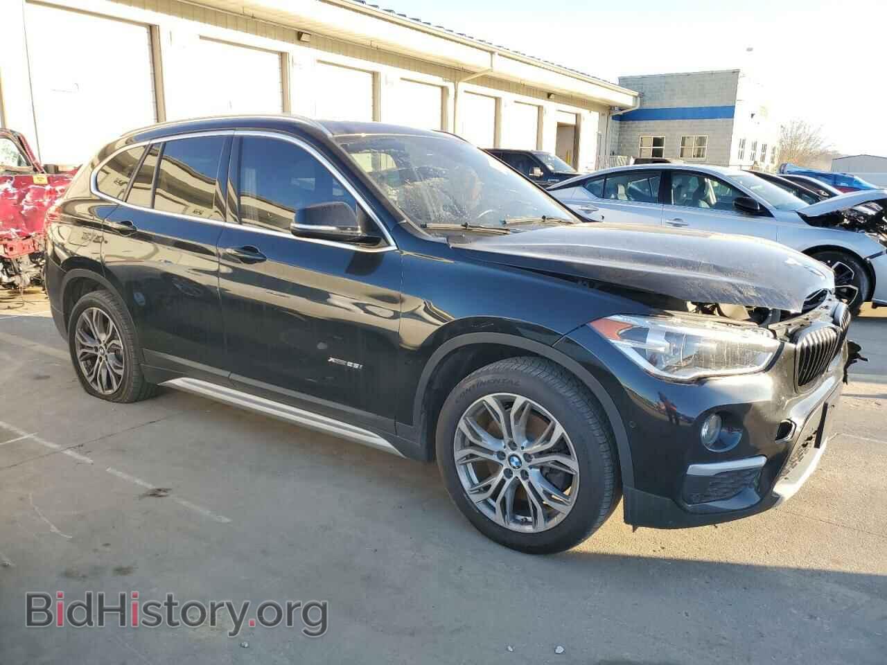 2017 BMW X1 - VIN: WBXHT3Z31H4A55236 - Фото 4
