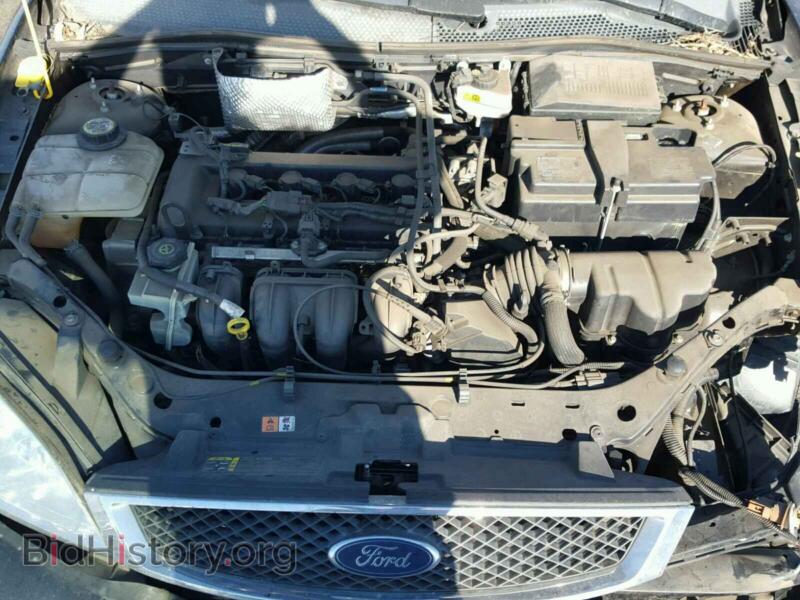 2007 Ford FOCUS (VIN 1FAHP37N97W125206) — фото 7 из 10