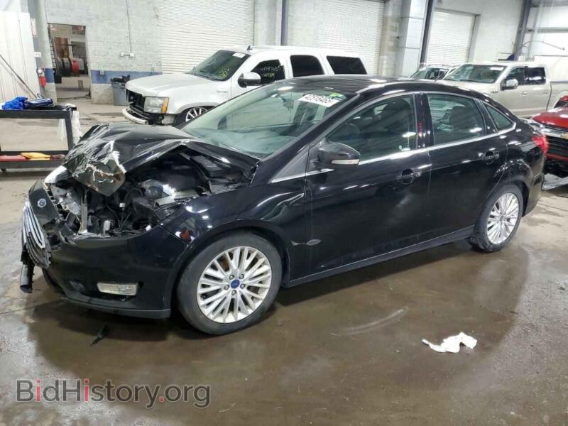 2017 Ford FOCUS Titanium (VIN 1FADP3J27HL260555) — photo 1 of 14, Copart, damage: front end