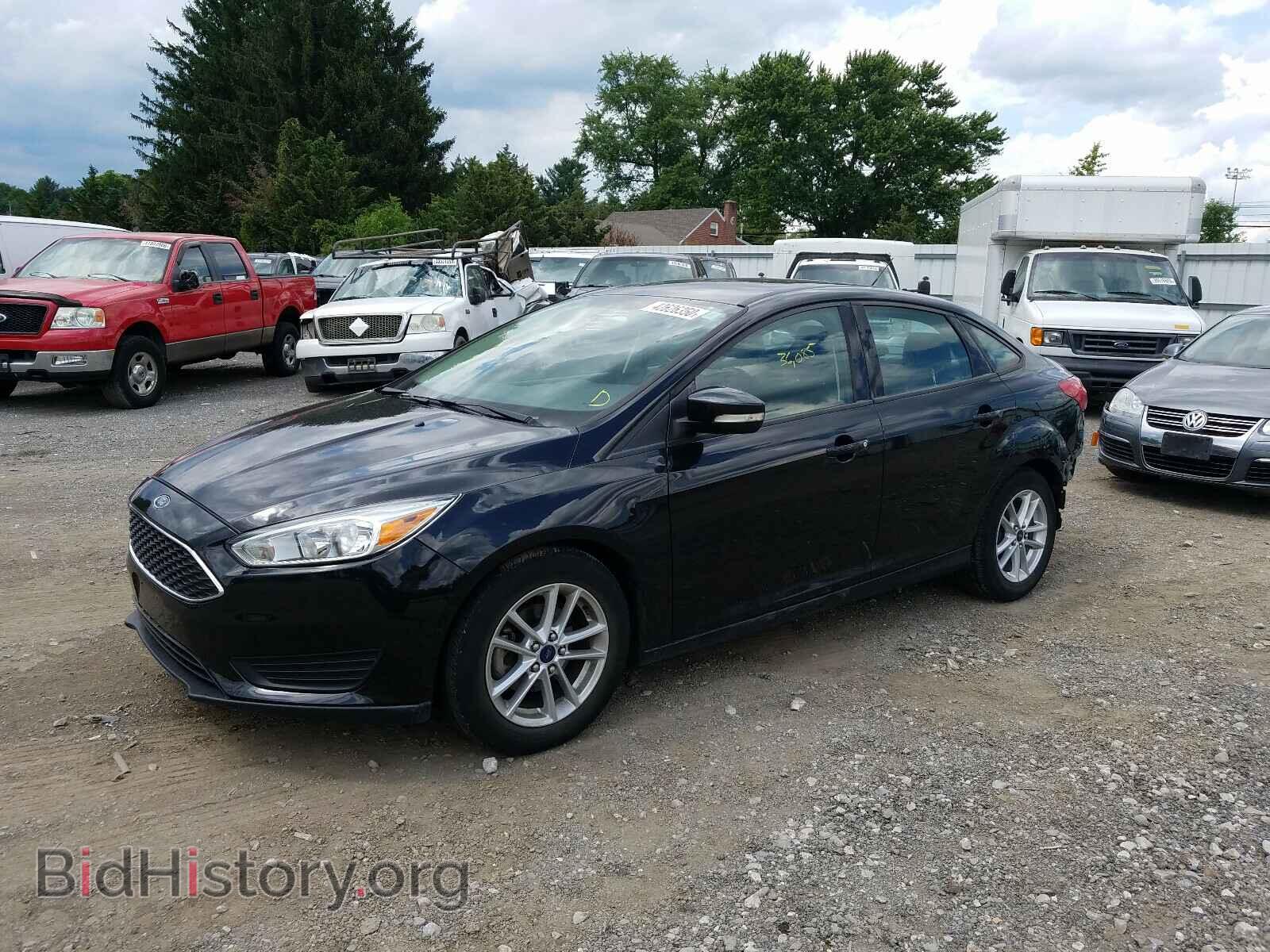 2015 FORD FOCUS - VIN: 1FADP3F20FL304840 - Photo 2