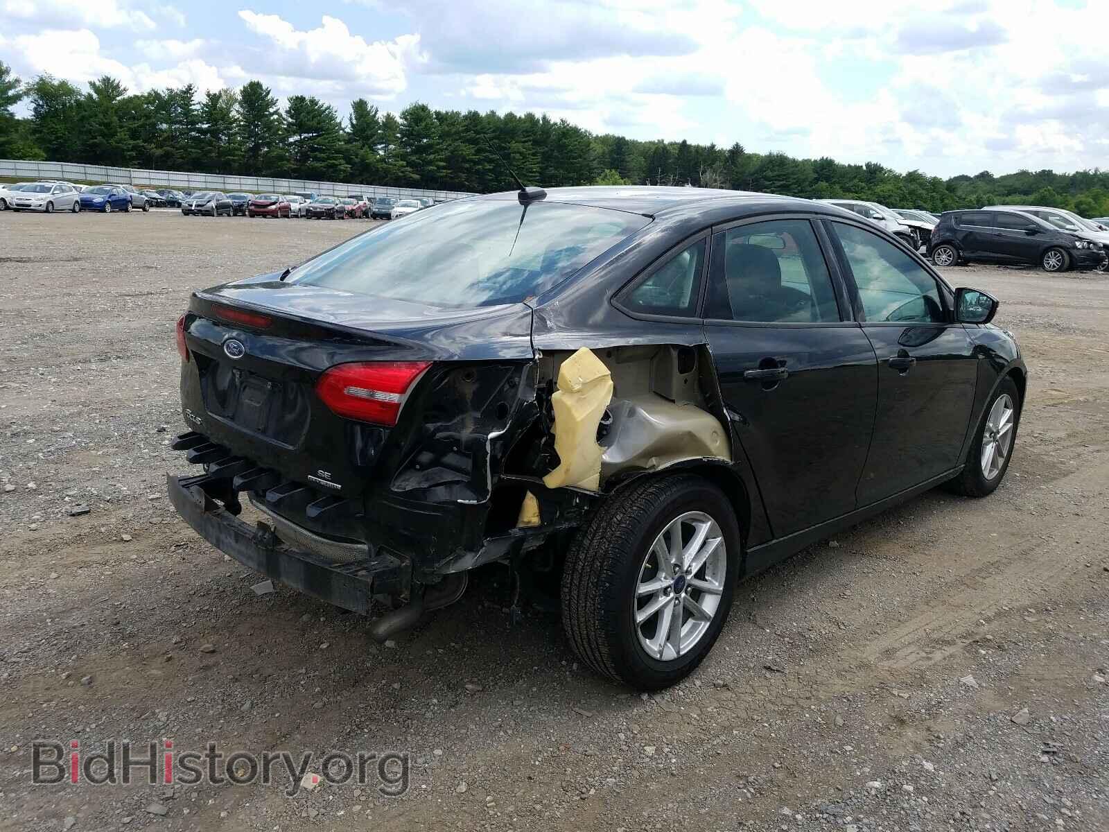 2015 FORD FOCUS - VIN: 1FADP3F20FL304840 - Photo 4