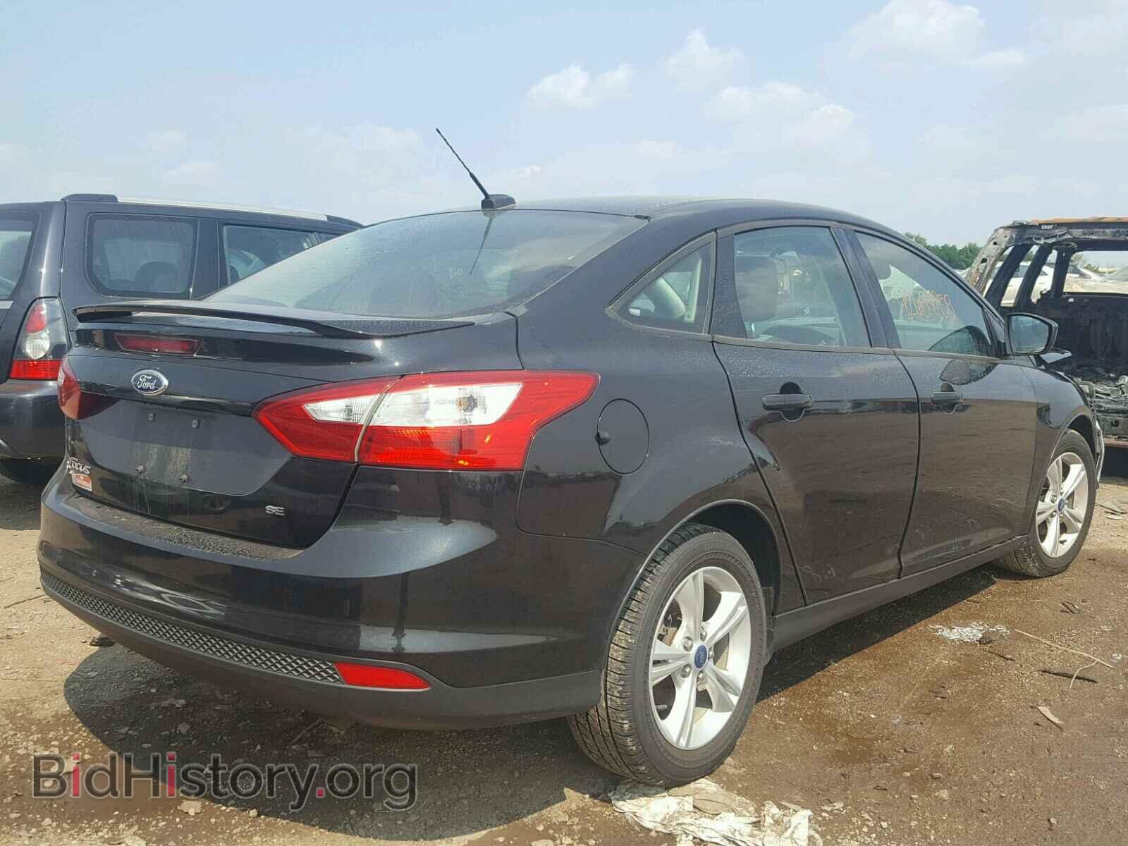 2012 Ford FOCUS (VIN 1FAHP3F27CL299276) — photo 4 of 10