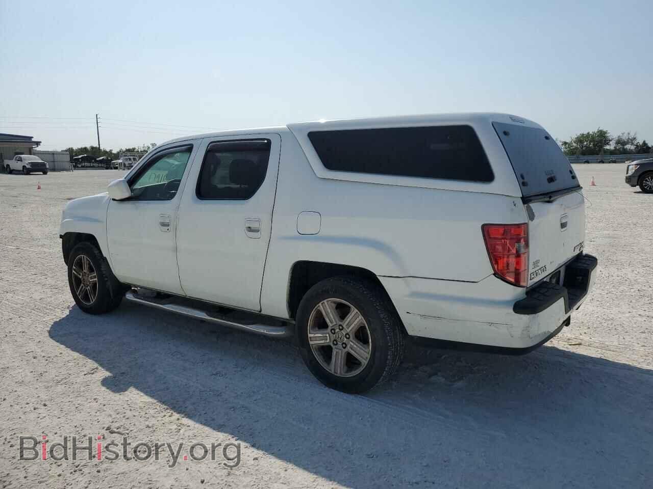 2011 HONDA RIDGELINE - VIN: 5FPYK1F55BB010296 - Фото 2
