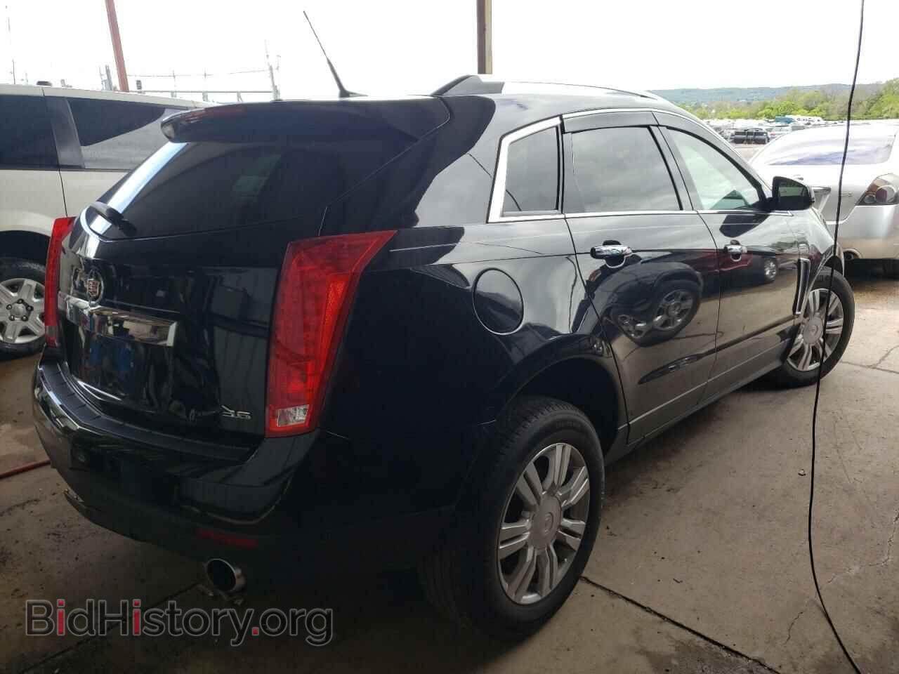 2014 CADILLAC SRX - VIN: 3GYFNBE30ES611005 - Фото 4