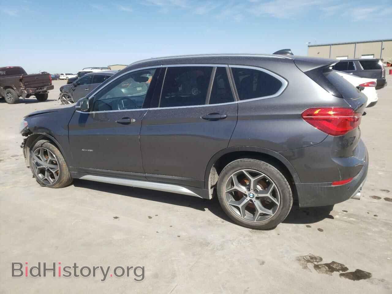 2017 BMW X1 - VIN: WBXHT3Z32H4A57562 - Фото 2