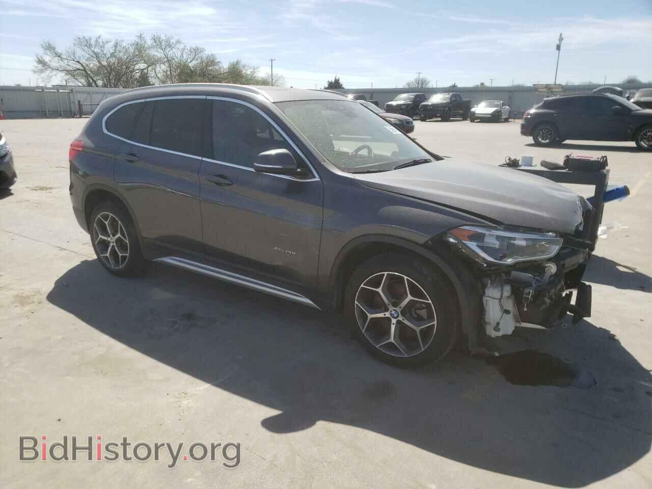 2017 BMW X1 - VIN: WBXHT3Z32H4A57562 - Фото 4