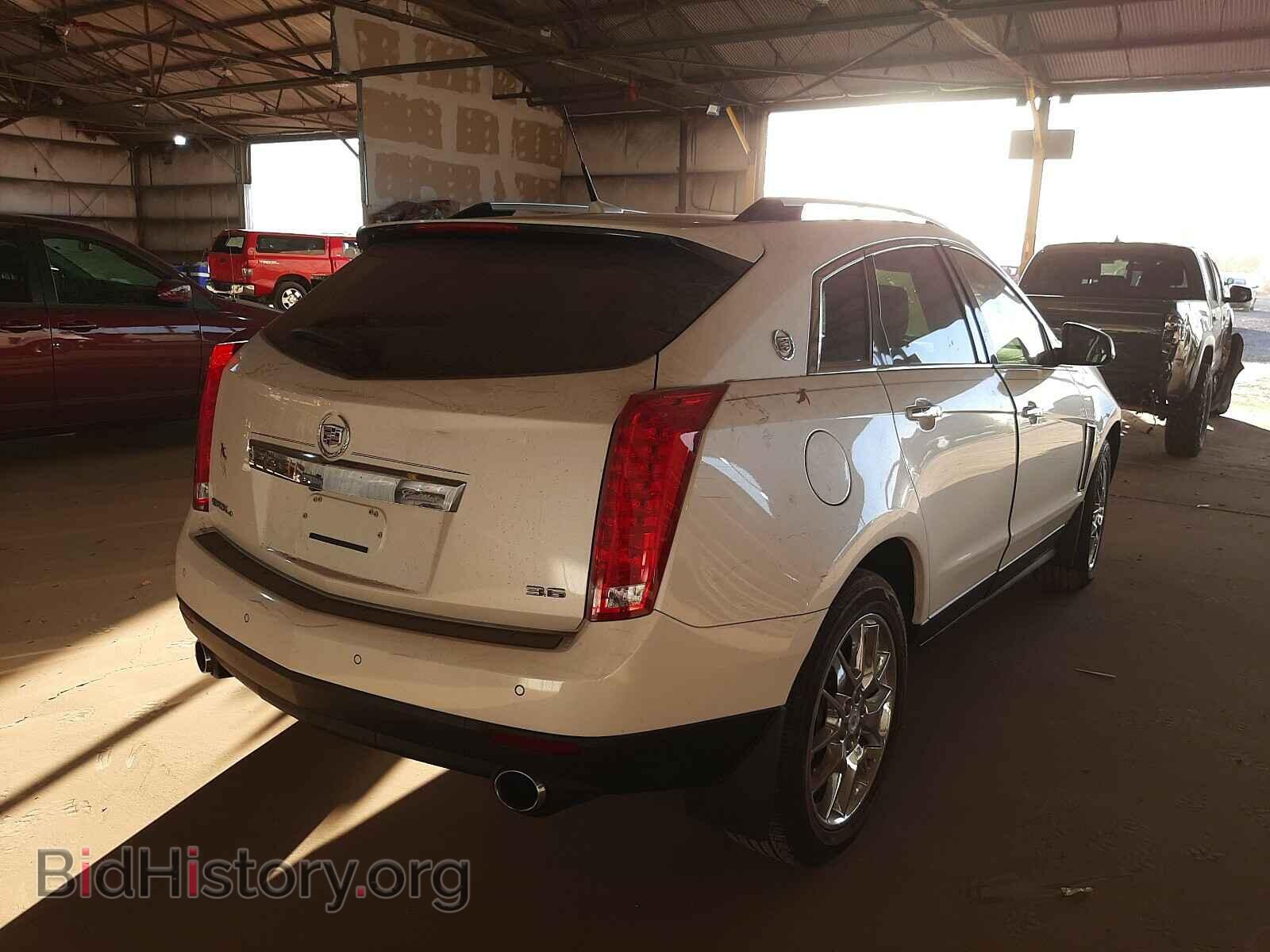 2013 CADILLAC SRX - VIN: 3GYFNHE31DS623410 - Фото 4