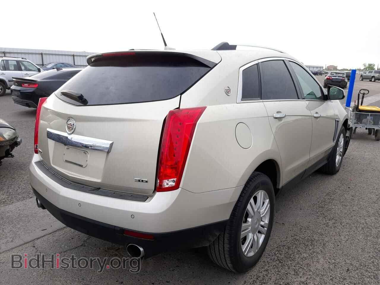 2014 CADILLAC SRX - VIN: 3GYFNBE31ES653795 - Фото 4