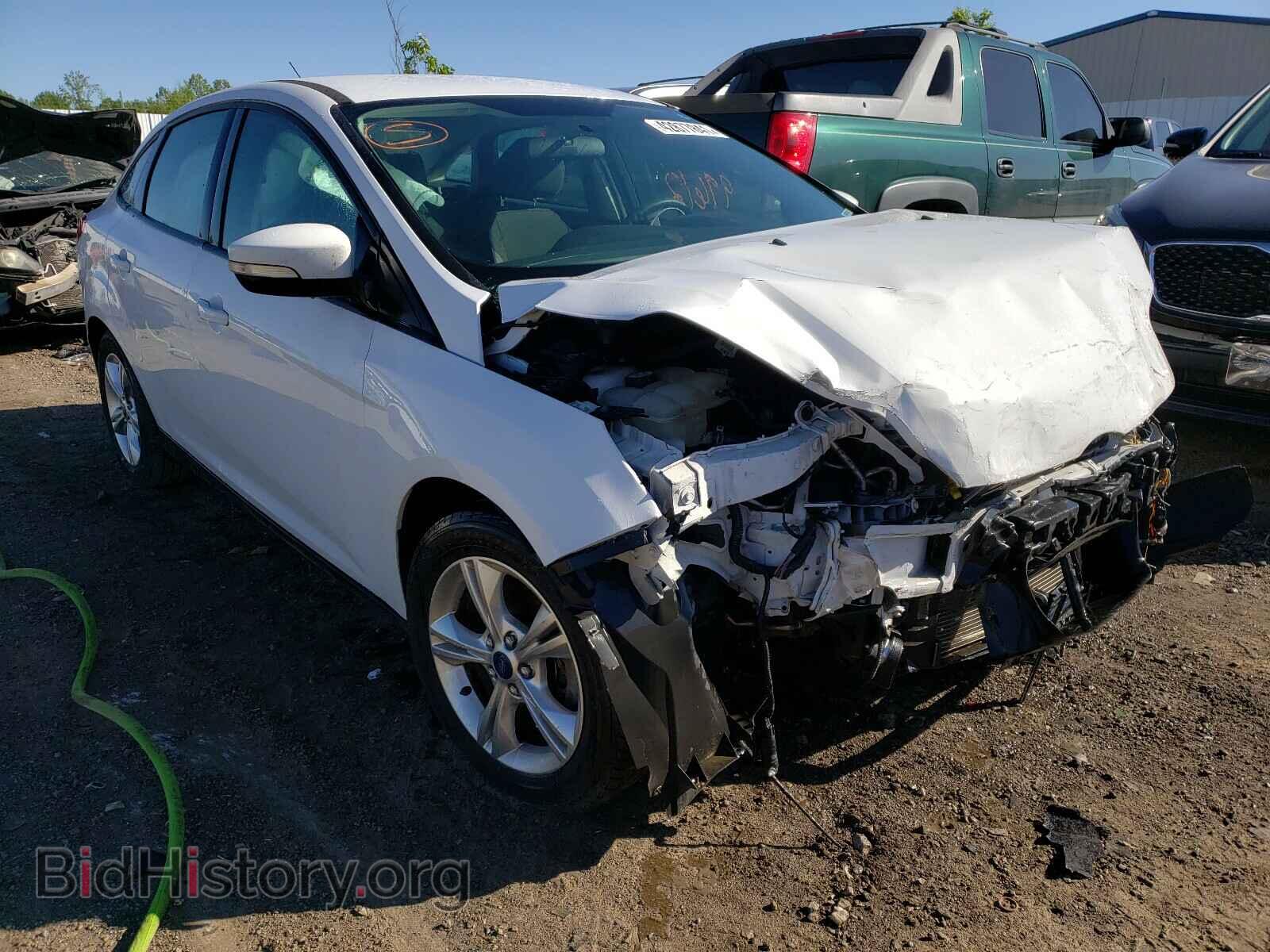 Фотография 1FADP3F29DL283421 - FORD FOCUS 2013