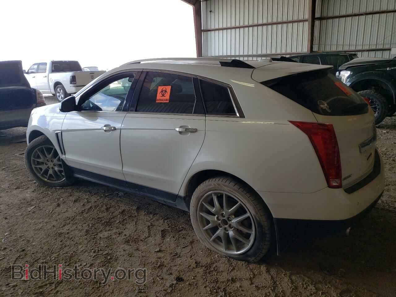 2014 CADILLAC SRX - VIN: 3GYFNCE33ES581620 - Фото 2