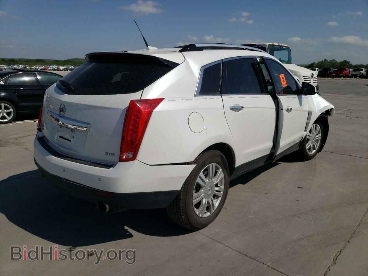 2012 CADILLAC SRX - VIN: 3GYFNAE39CS657052 - Фото 4