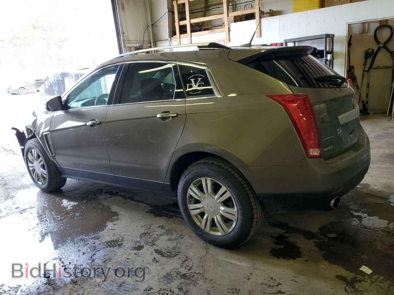 2014 CADILLAC SRX - VIN: 3GYFNBE33ES631586 - Фото 2