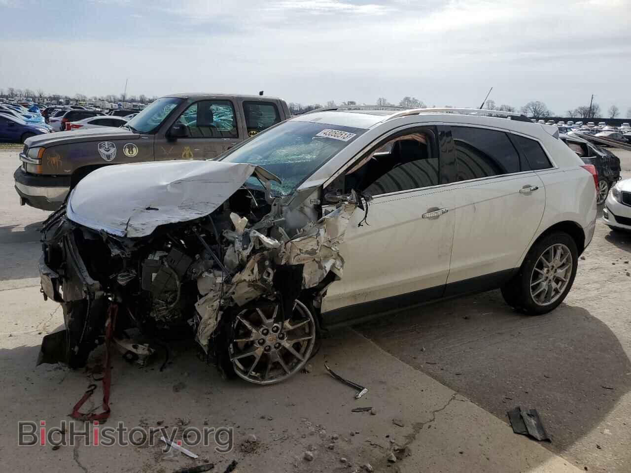 Фотография 3GYFNCE31ES663068 - CADILLAC SRX 2014
