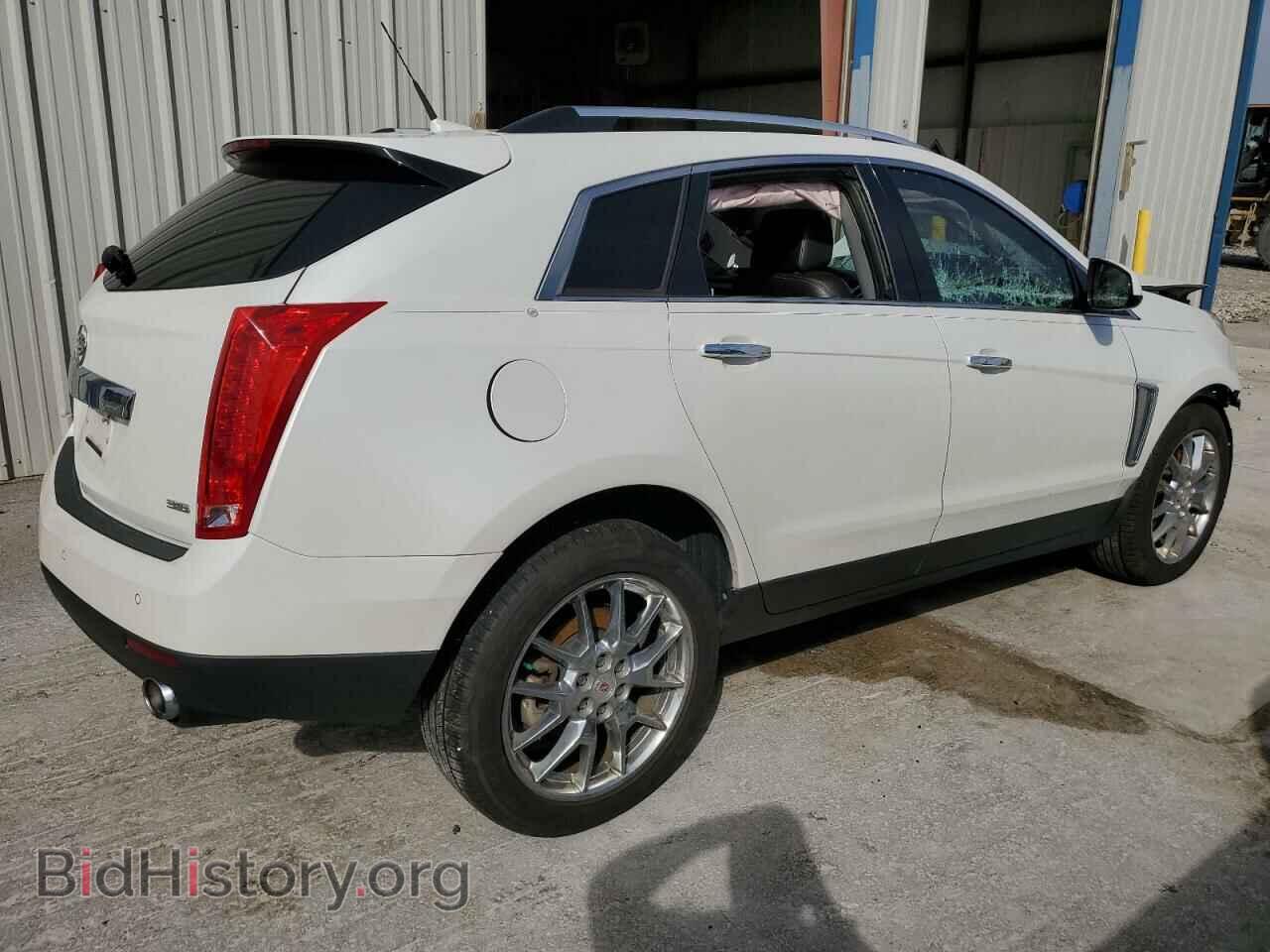 2014 CADILLAC SRX - VIN: 3GYFNCE31ES663068 - Фото 3