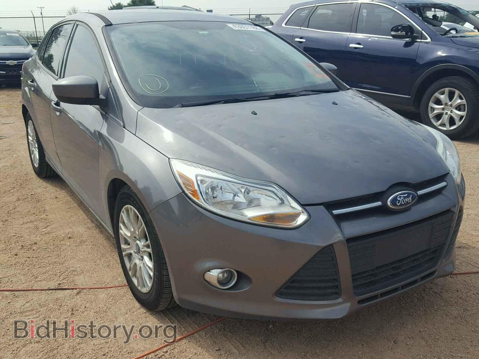 2012 Ford FOCUS Focus SE (VIN 1FAHP3F24CL156317) — фото 1 из 10, Copart, повреждение: град
