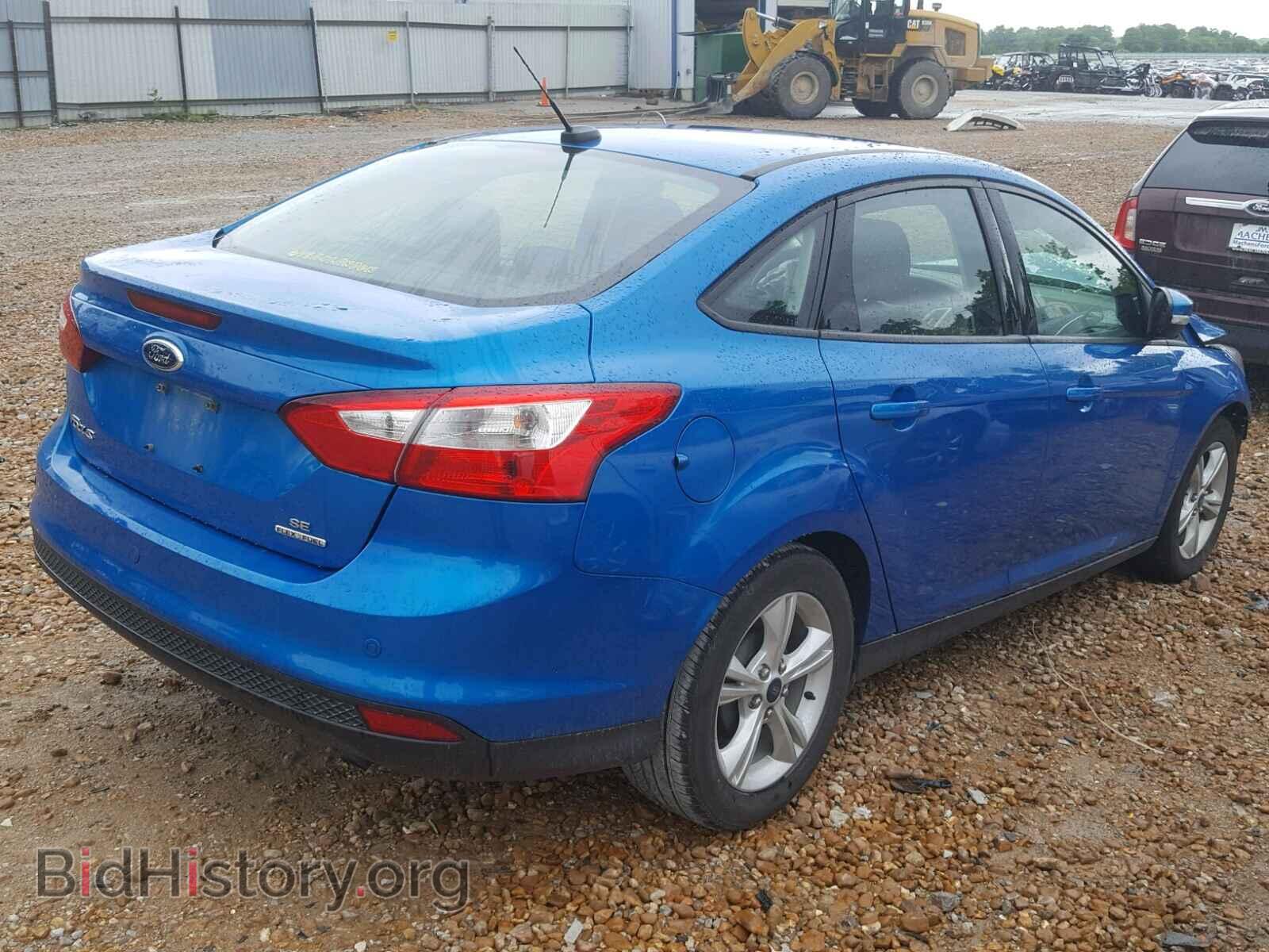 2014 FORD FOCUS - VIN: 1FADP3F29EL441001 - Photo 4