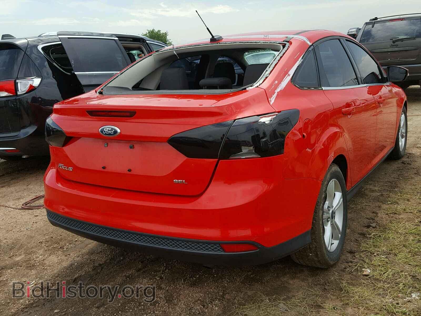 2012 Ford FOCUS (VIN 1FAHP3H2XCL184989) — photo 4 of 10