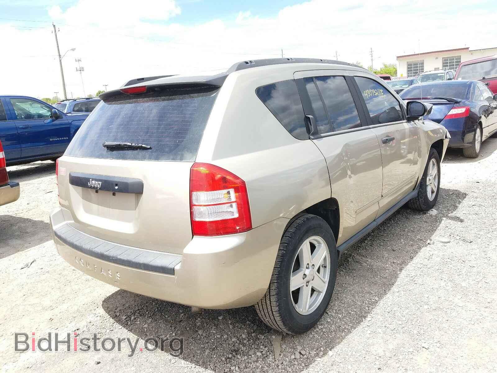 2010 JEEP COMPASS - VIN: 1J4NT4FB9AD504001 - Photo 4