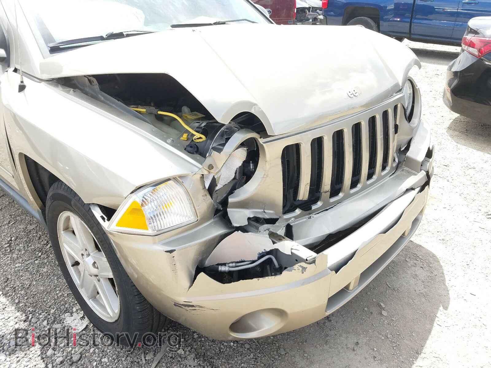 2010 JEEP COMPASS - VIN: 1J4NT4FB9AD504001 - Photo 9