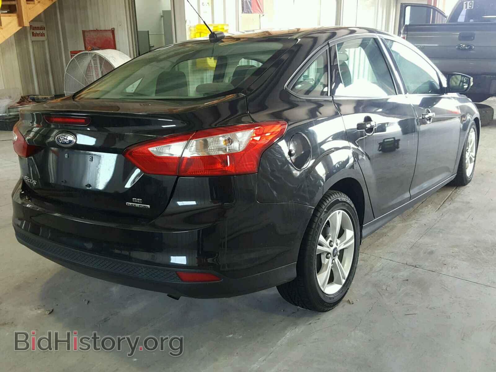 2014 FORD FOCUS - VIN: 1FADP3F22EL195814 - Photo 4