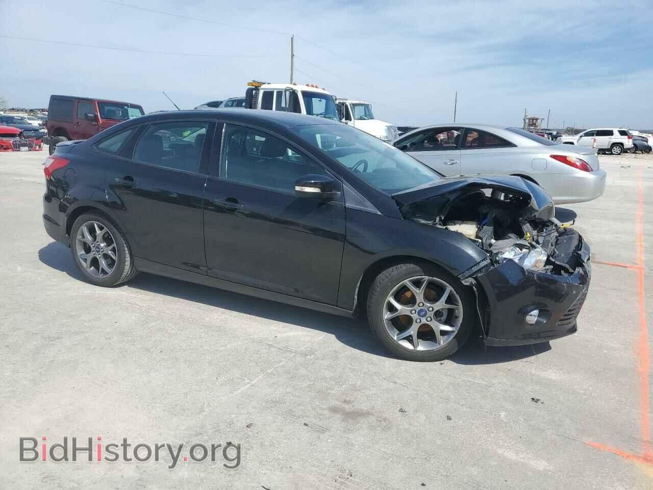 2014 FORD FOCUS - VIN: 1FADP3F28EL451924 - Photo 4