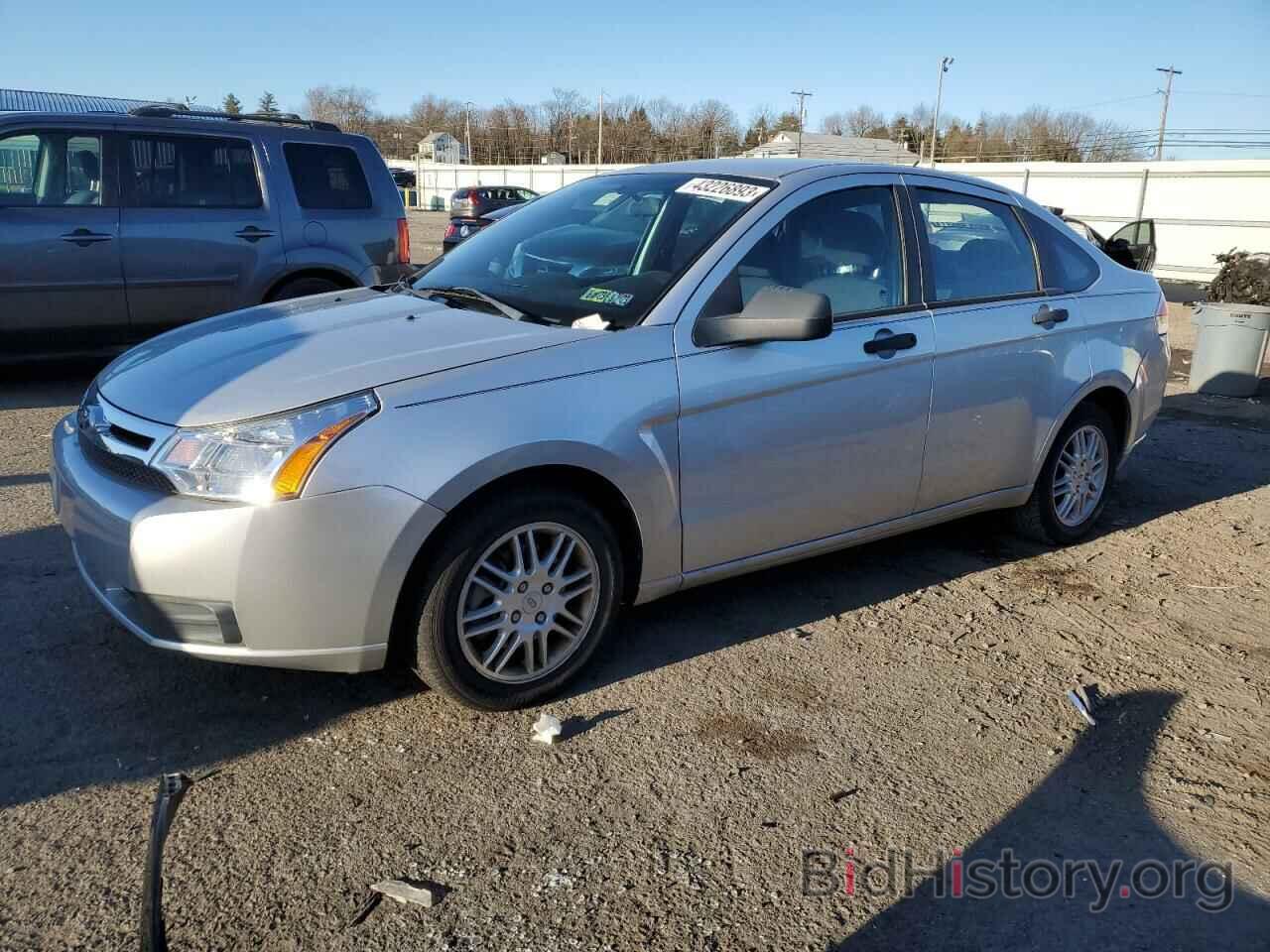 Photo 1FAHP3FN6AW257929 - FORD FOCUS 2010