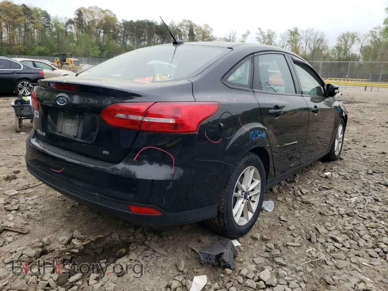 2015 FORD FOCUS - VIN: 1FADP3F20FL303980 - Photo 4