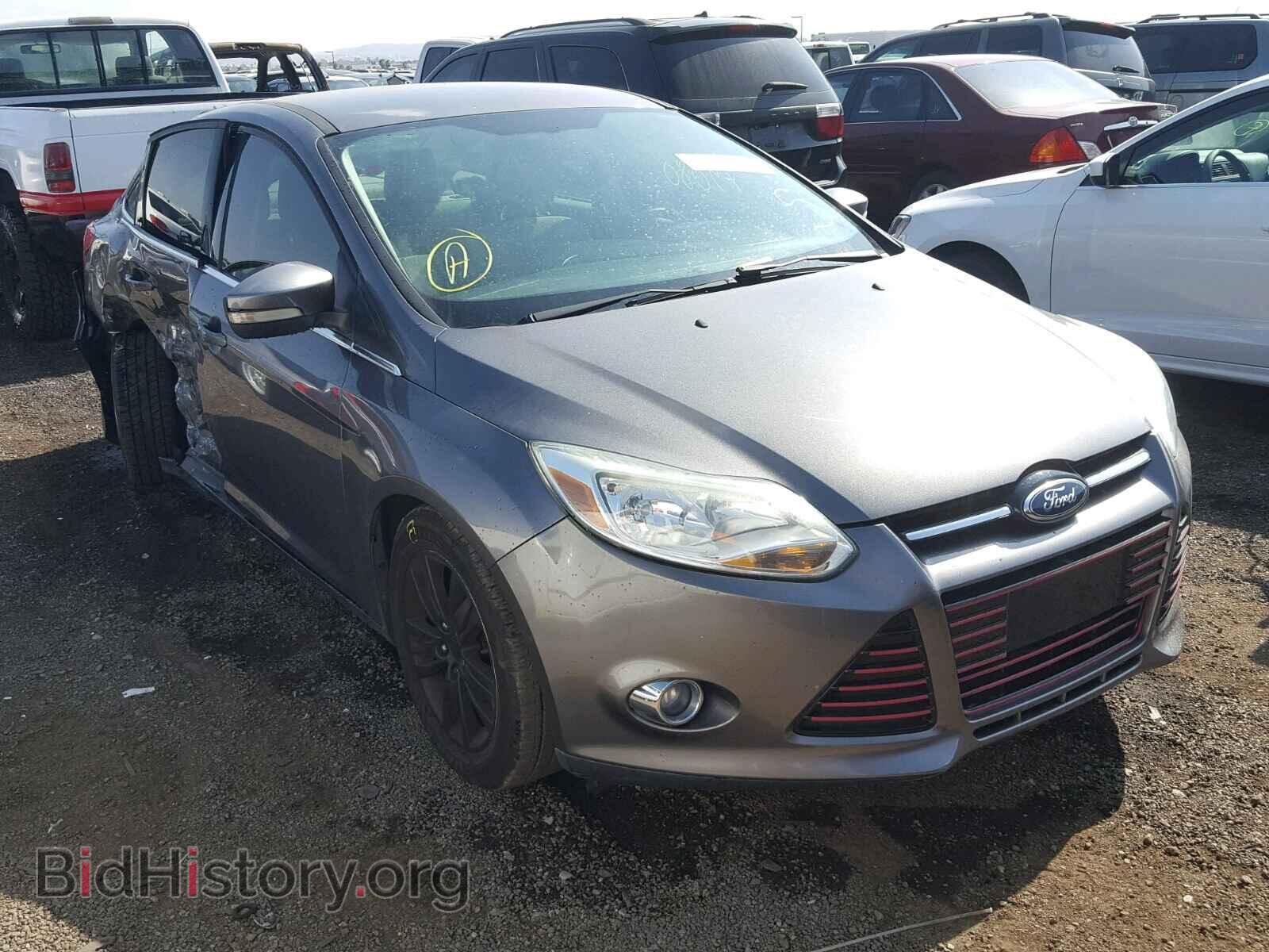 2012 Ford FOCUS Focus SEL (VIN 1FAHP3H25CL134291) — фото 1 из 10, Copart, повреждение: бок