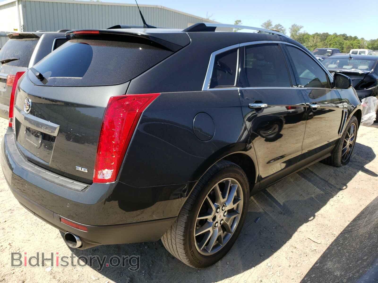 2014 CADILLAC SRX - VIN: 3GYFNDE34ES664673 - Фото 4