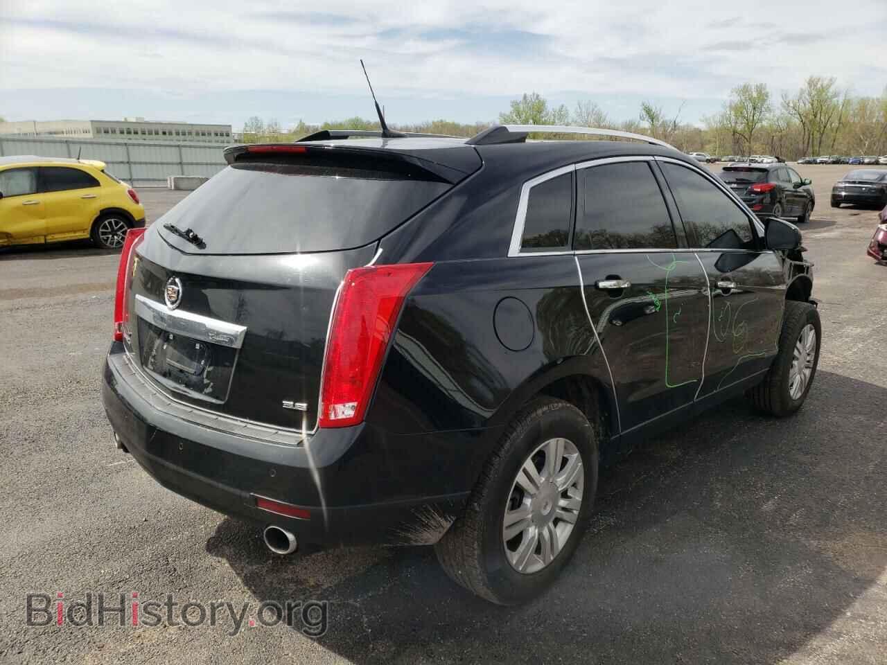 2014 CADILLAC SRX - VIN: 3GYFNEE35ES601457 - Фото 4