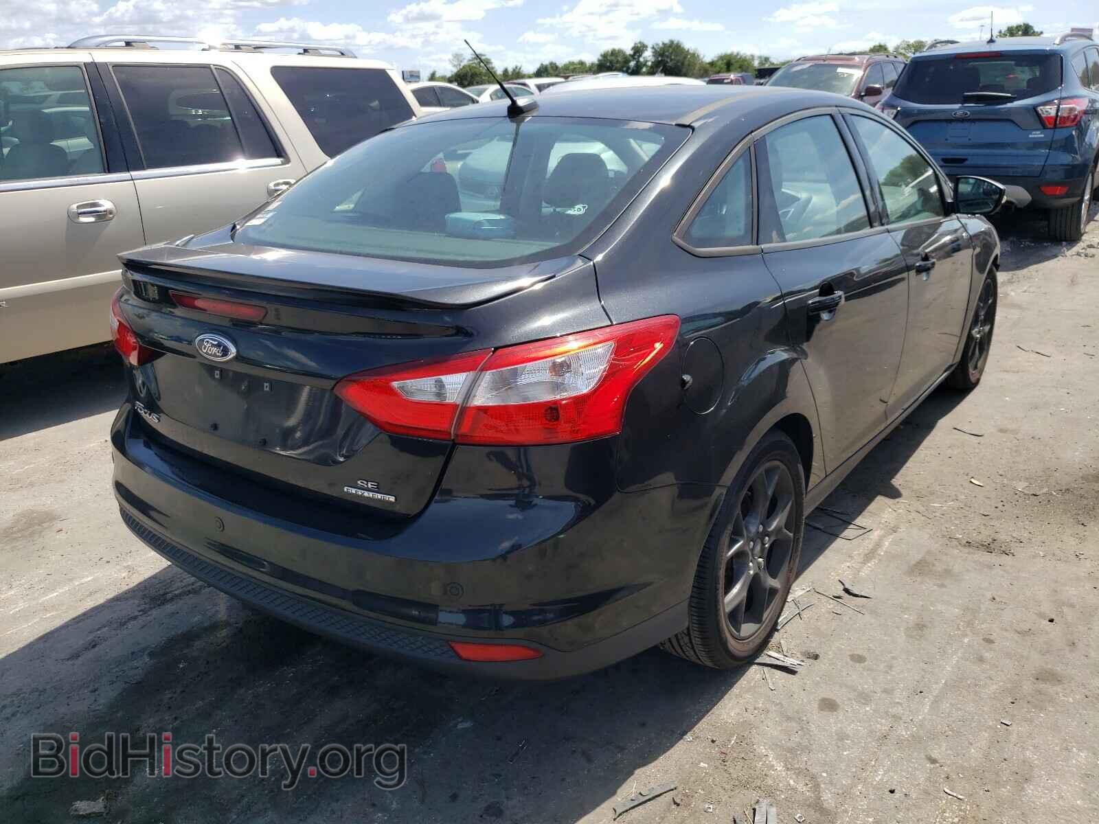 2014 FORD FOCUS - VIN: 1FADP3F2XEL371296 - Photo 4