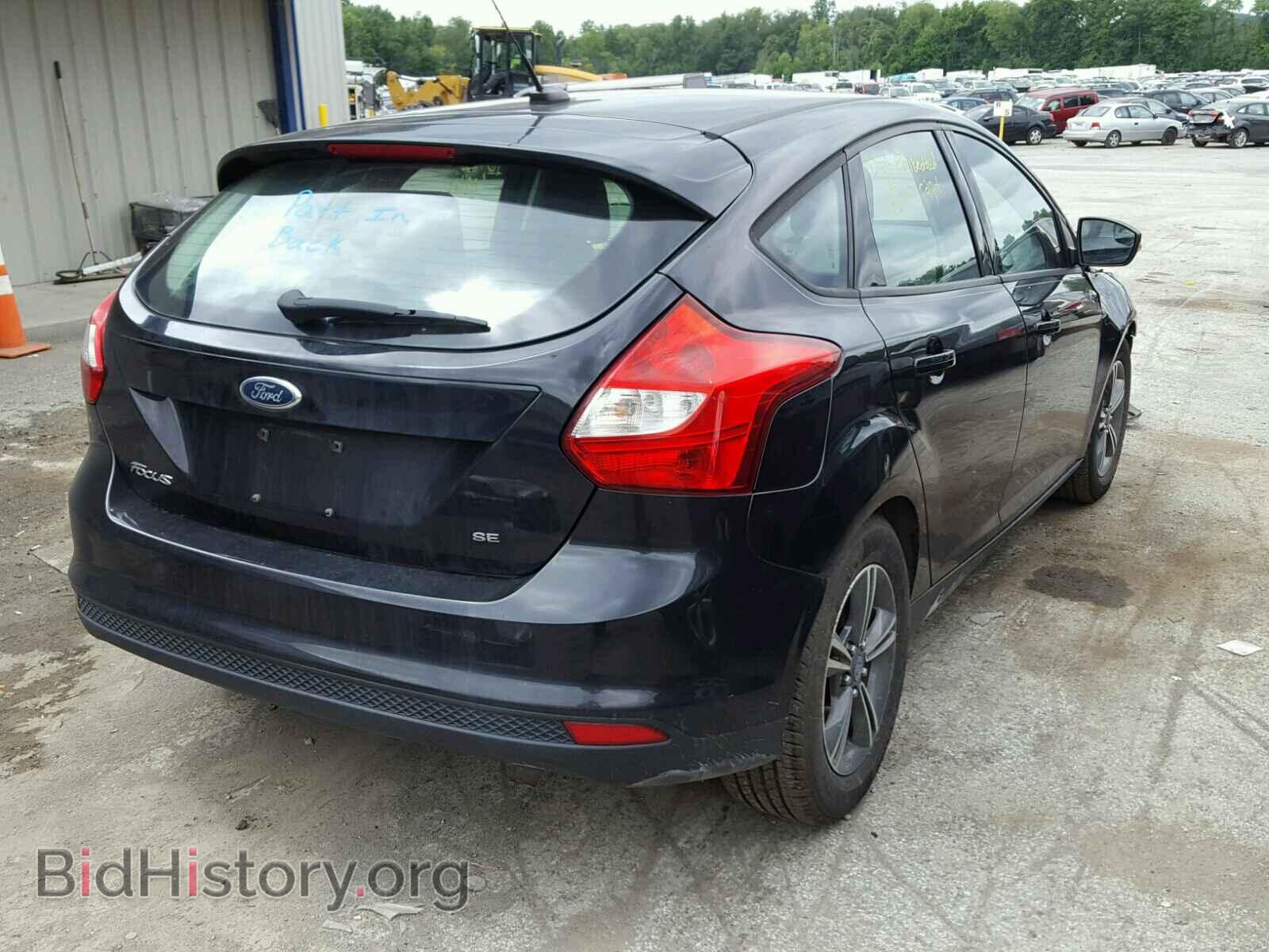2012 Ford FOCUS (VIN 1FAHP3K23CL319318) — photo 4 of 10