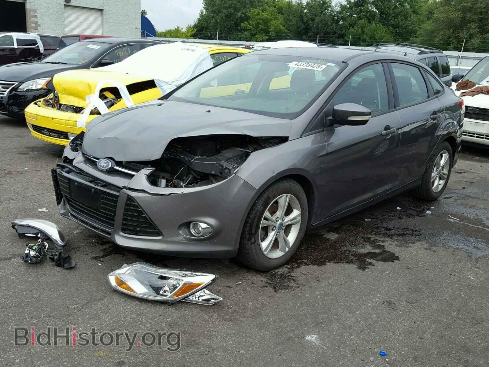 2012 Ford FOCUS (VIN 1FAHP3F21CL210401) — photo 2 of 10
