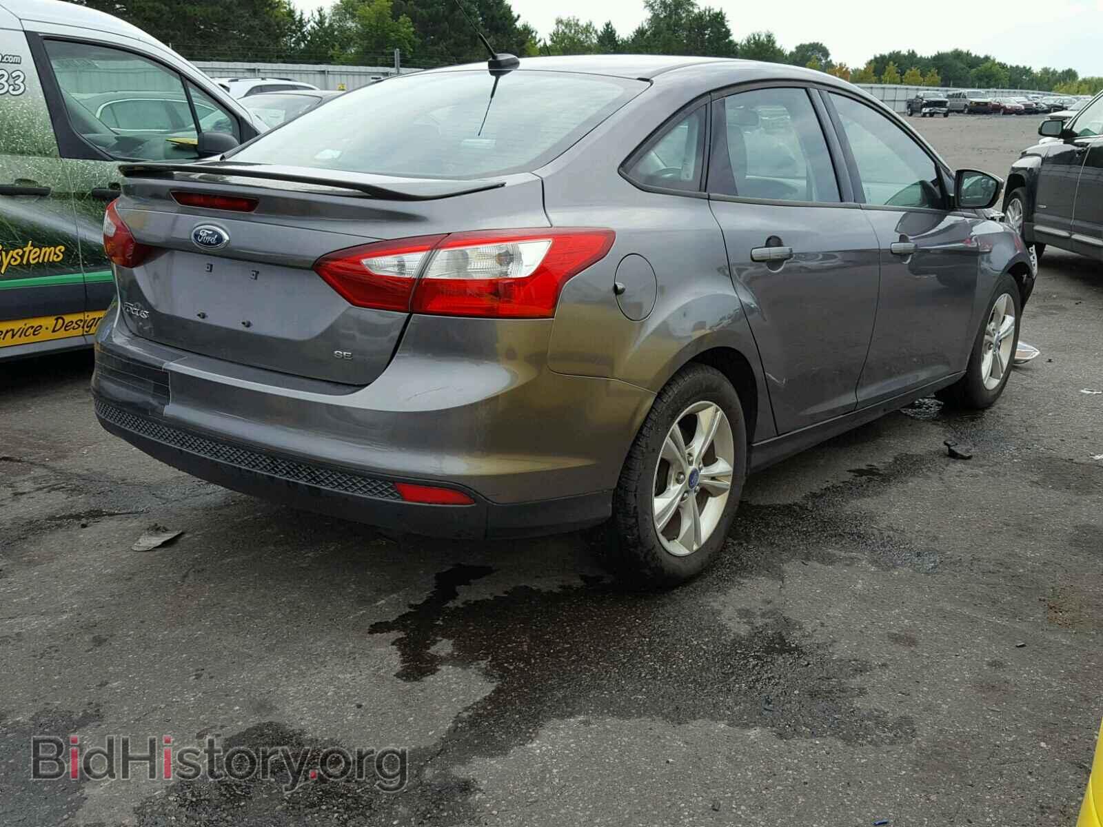 2012 Ford FOCUS (VIN 1FAHP3F21CL210401) — photo 4 of 10