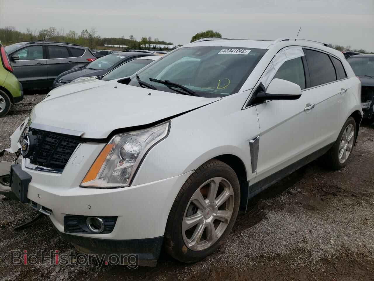 2014 CADILLAC SRX - VIN: 3GYFNFE35ES560270 - Фото 2
