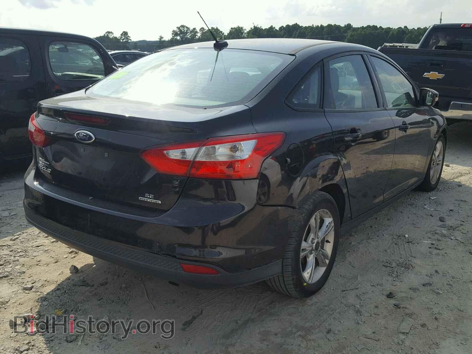 2014 FORD FOCUS - VIN: 1FADP3F2XEL202928 - Photo 4