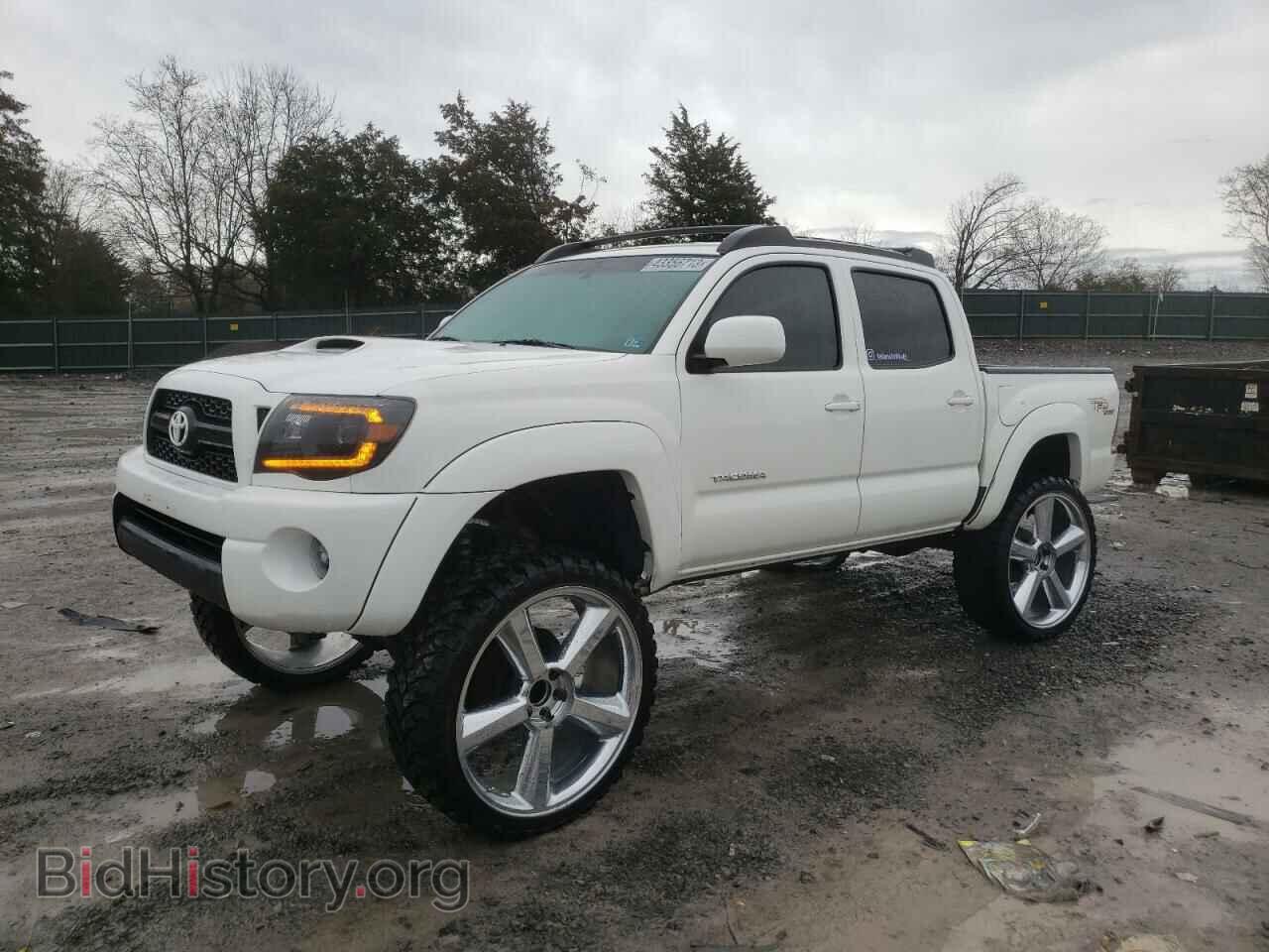 Photo 3TMLU4EN9BM057357 - TOYOTA TACOMA 2011