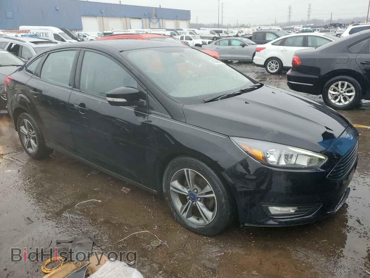 2016 FORD FOCUS - VIN: 1FADP3FE0GL215829 - Photo 4