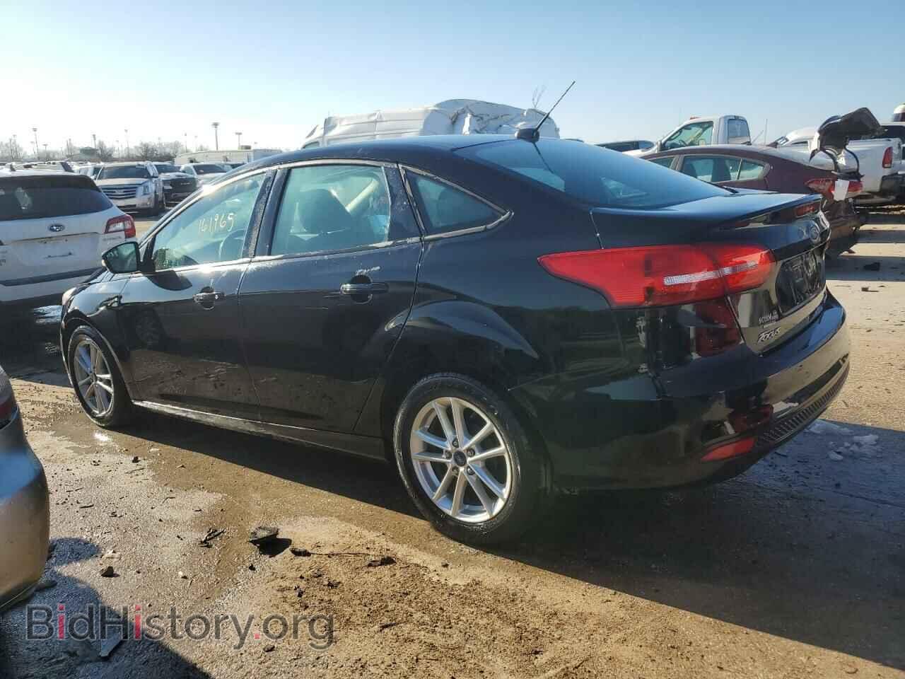 2016 FORD FOCUS - VIN: 1FADP3F21GL344104 - Фото 2