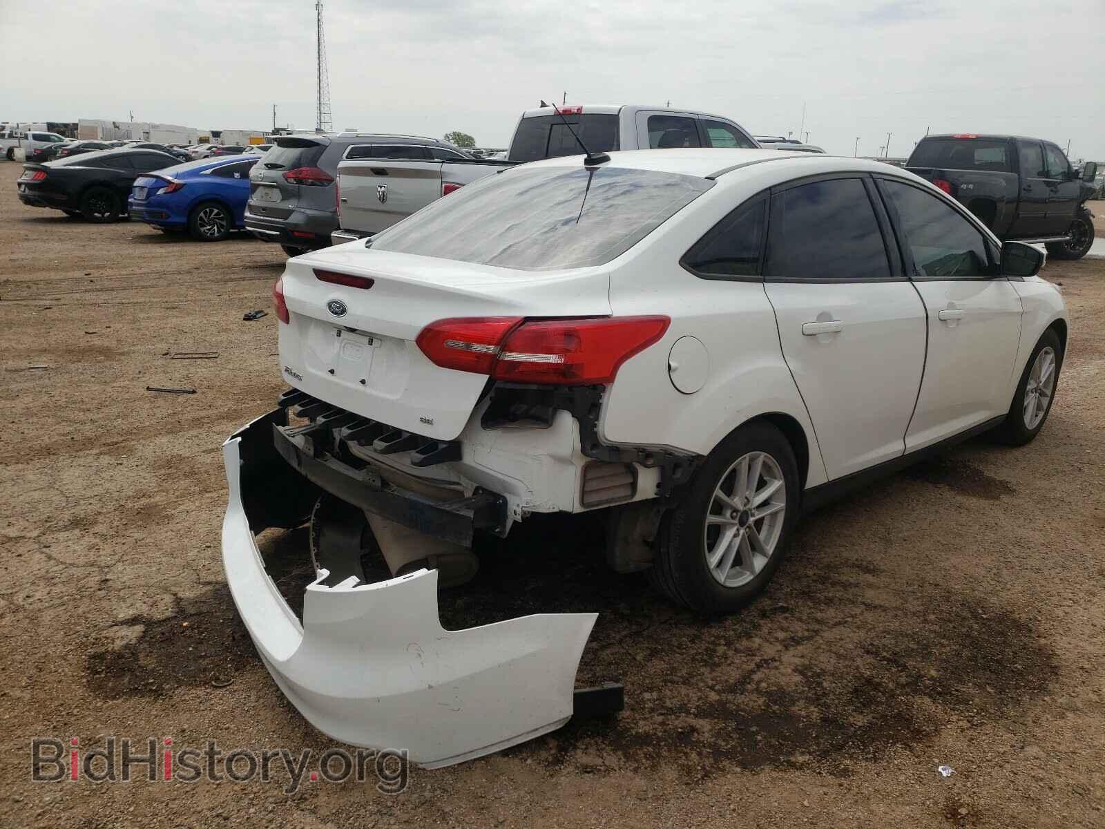 2017 FORD FOCUS - VIN: 1FADP3F20HL313881 - Photo 4
