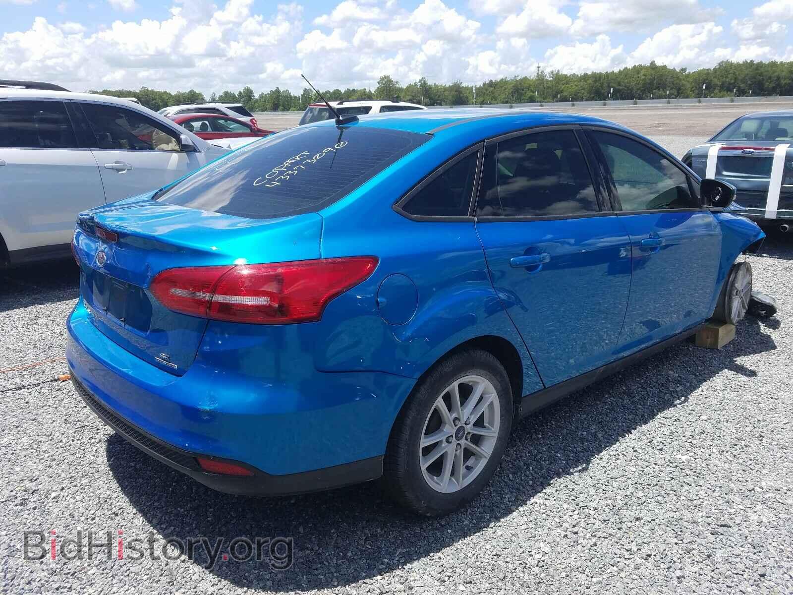 2016 FORD FOCUS - VIN: 1FADP3F29GL242212 - Photo 4