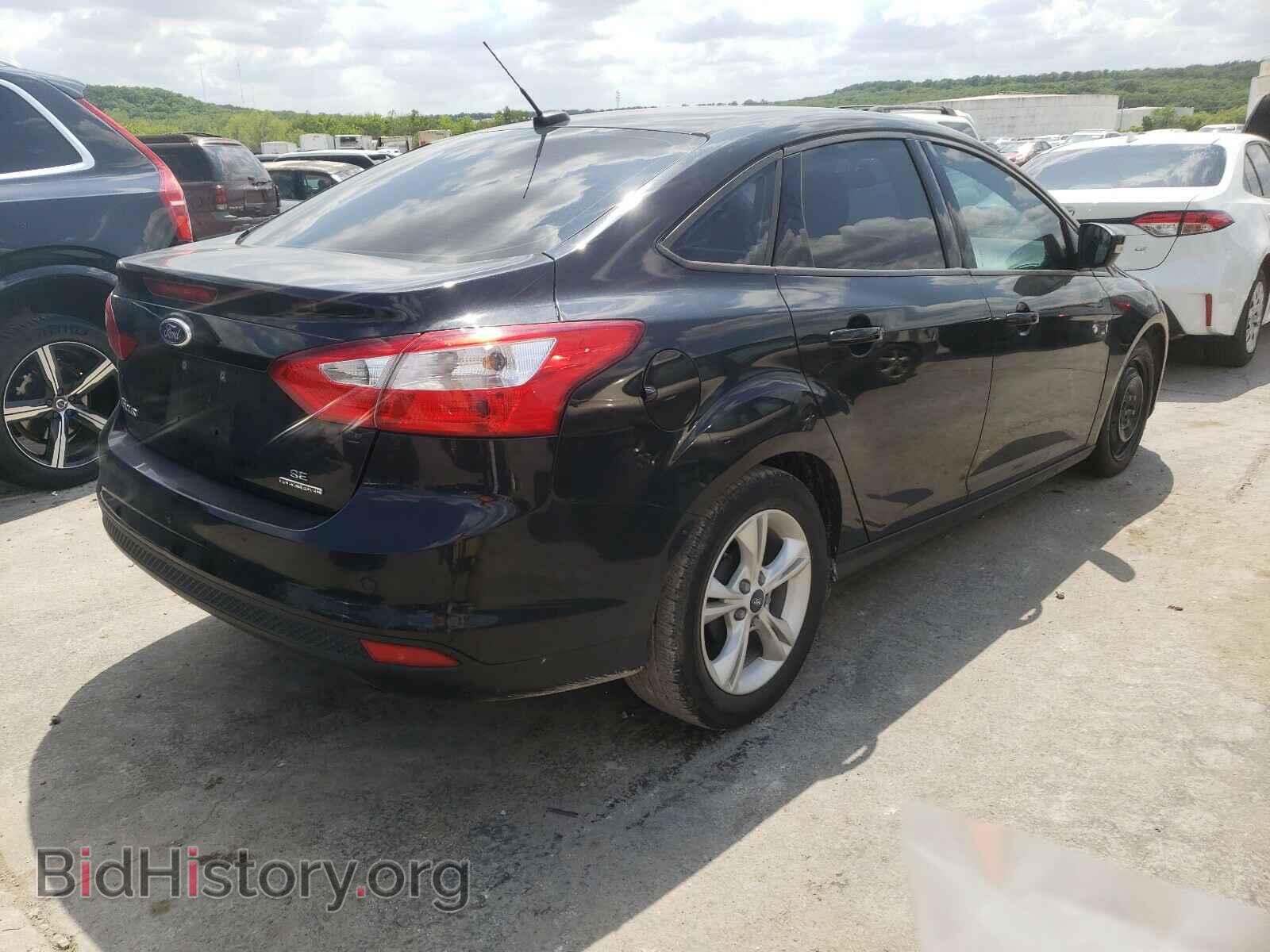 2014 FORD FOCUS - VIN: 1FADP3F2XEL453058 - Photo 4